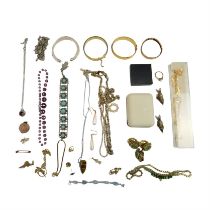 A quantity of costume jewellery including a baroque tiger's eye pendant