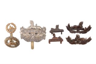 A small group of Gloucestershire Regiment cap and other badges