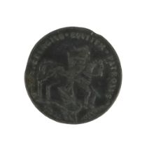 A base metal talisman, obverse St George and dragon with legend "S Georgius Equitum Patronus", verso