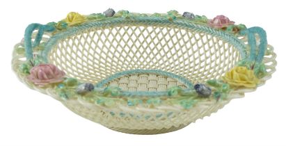 A Belleek floral basket, 22 cm