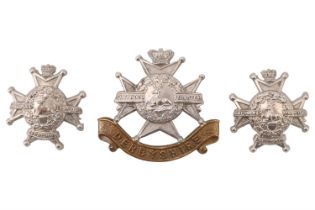 A Victorian Sherwood Foresters other rank's cap and collar badges