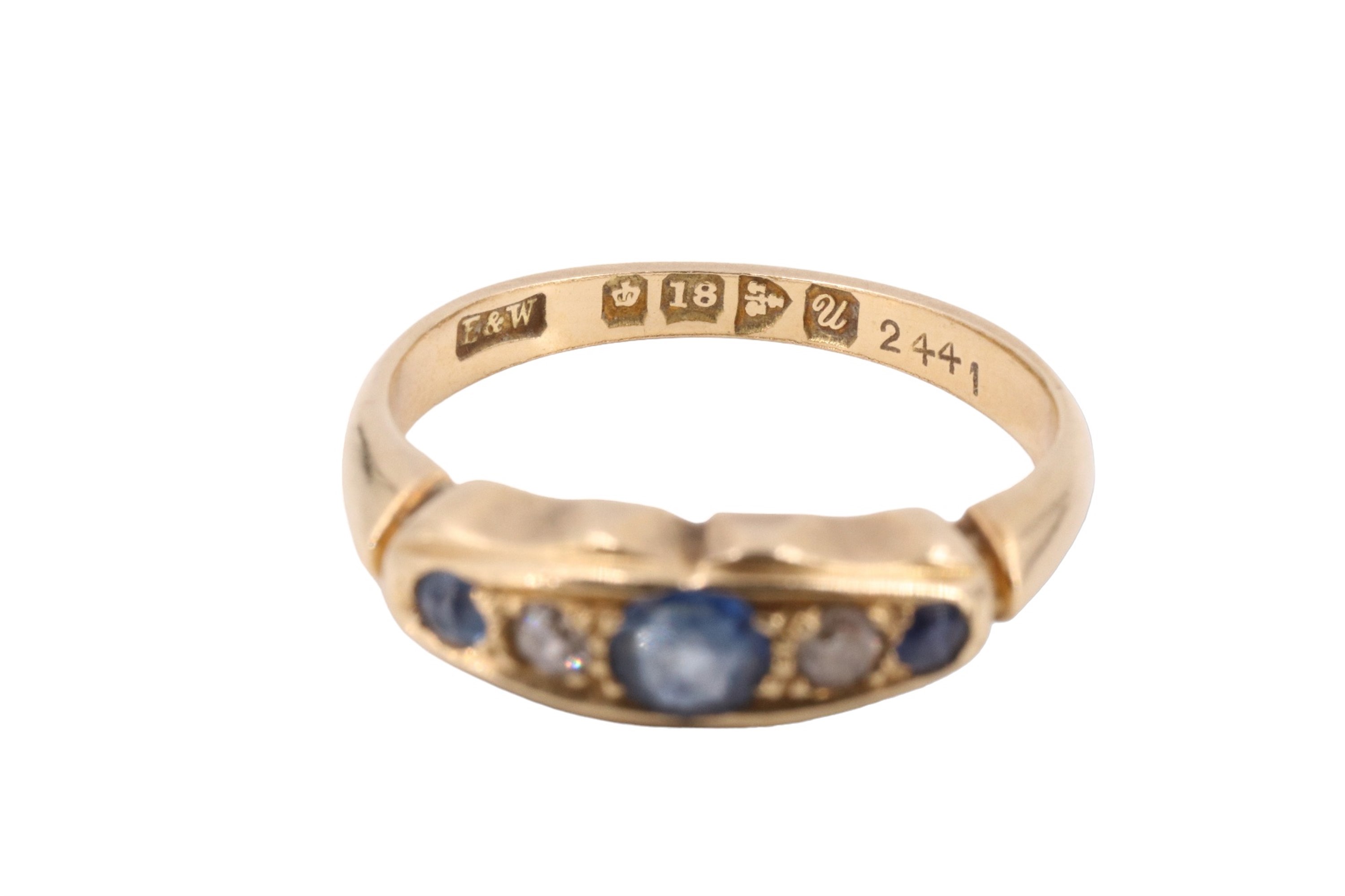 A George V sapphire and diamond finger ring, having a central 3 mm sapphire between two eight cut - Image 4 of 4