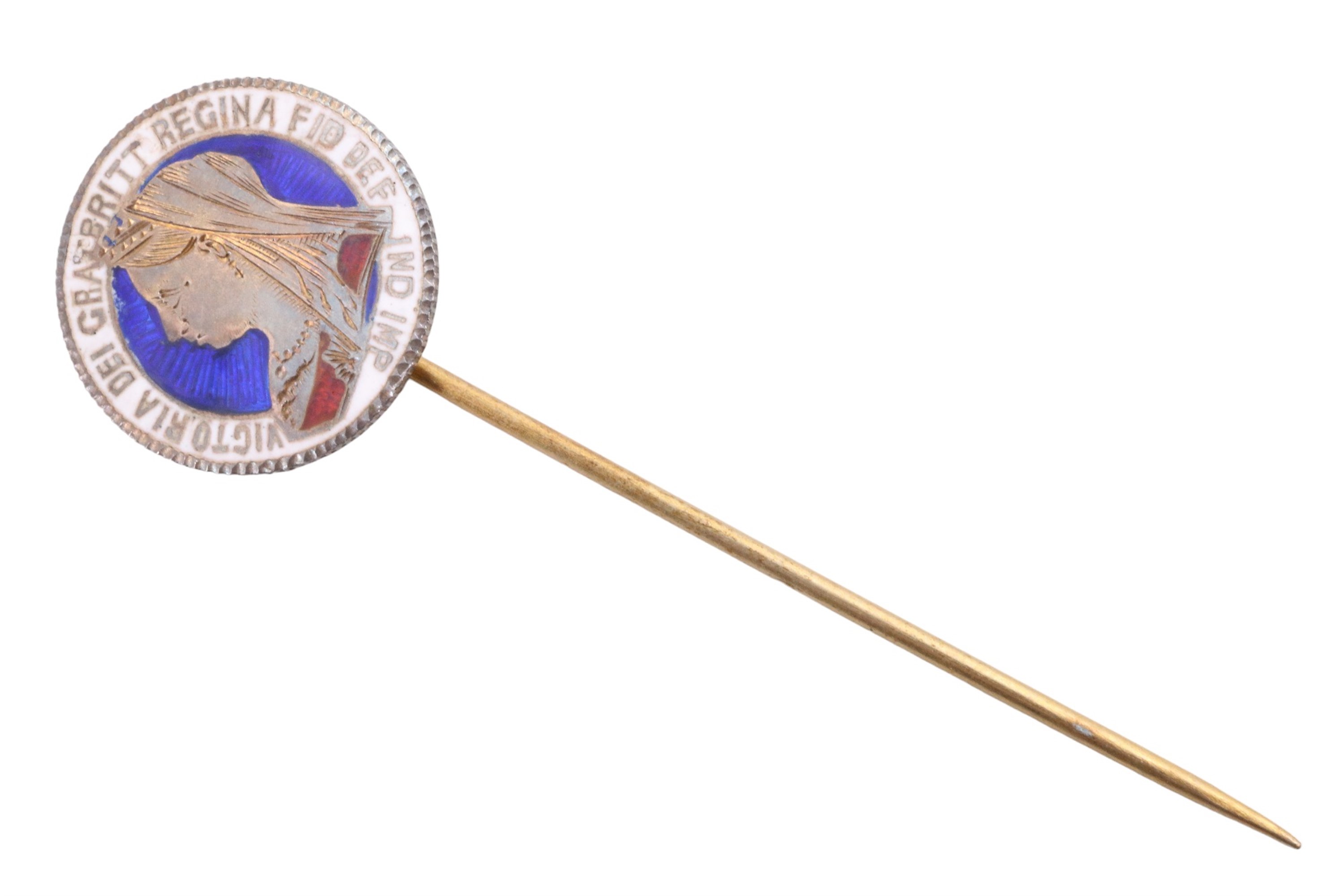 A Victorian enamelled and engraved sixpence coin stick pin