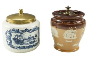 An early 20th Century Royal Doulton salt glazed tobacco jar together with a Royal Goewaagen Gouda