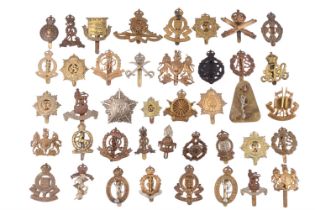 A collection of corps and other cap badges