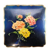 A vintage Stratton powder compact decorated in depiction of chrysanthemums