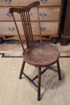 A late 19th / early 20th Century child's mahogany comb back chair, 80 cm