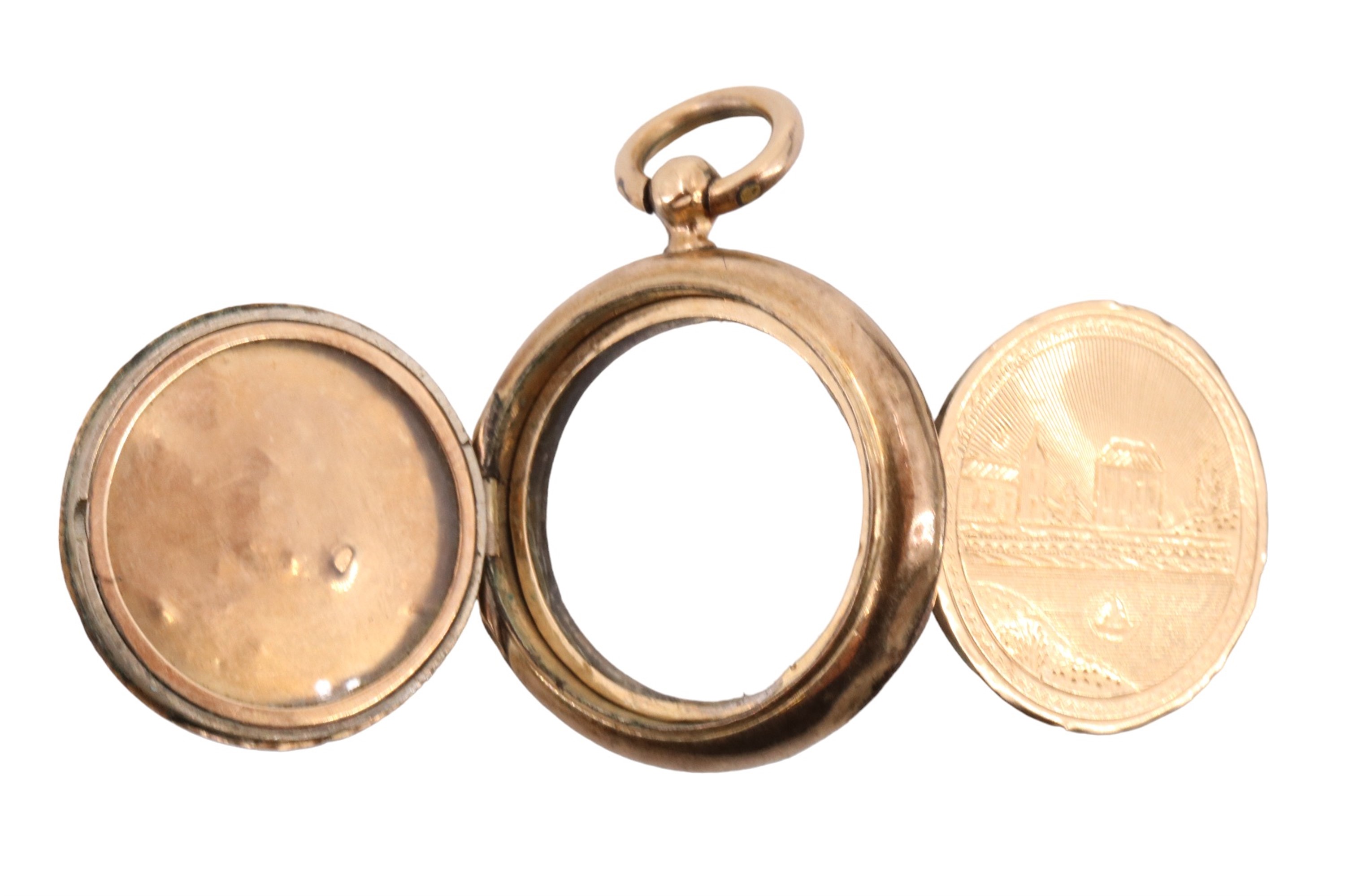 A vintage French gold triple locket, the front engraved with a church and house on a river - Image 3 of 3