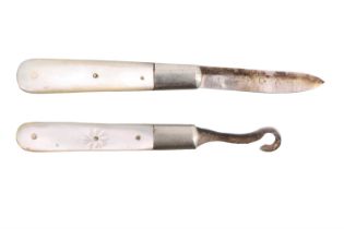 A small Victorian silver and mother-of-pearl fruit knife and a button hook, both by James Fenton,