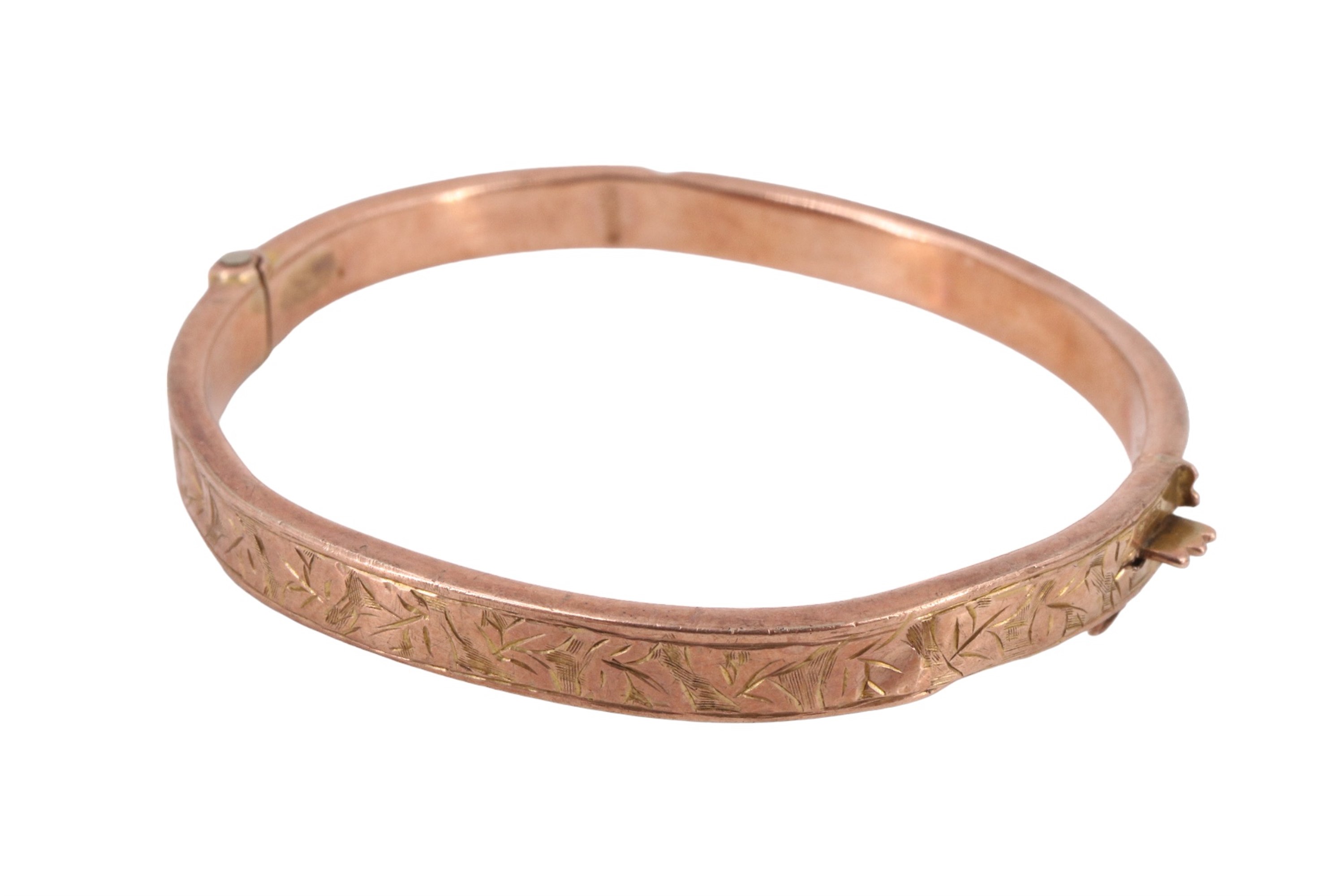 A vintage child's 9 ct rose gold hinged bangle, rubbed assay marks, 4.58 g, 14 cm internally