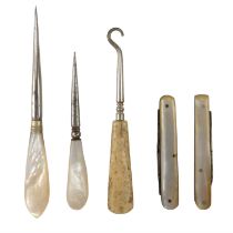 Two mother-of-pearl handled penknives, together with two mother-of-pearl handled bodkins and a