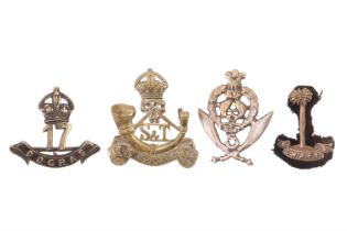 A King's African Rifles Supply & Transport Corps cap badge together with a Royal West African