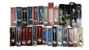 A large quantity of souvenir teaspoons, in original packaging