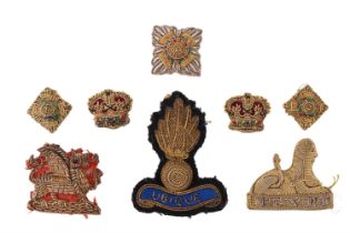 A small group of British army bullion-embroidered cap, collar and rank badges