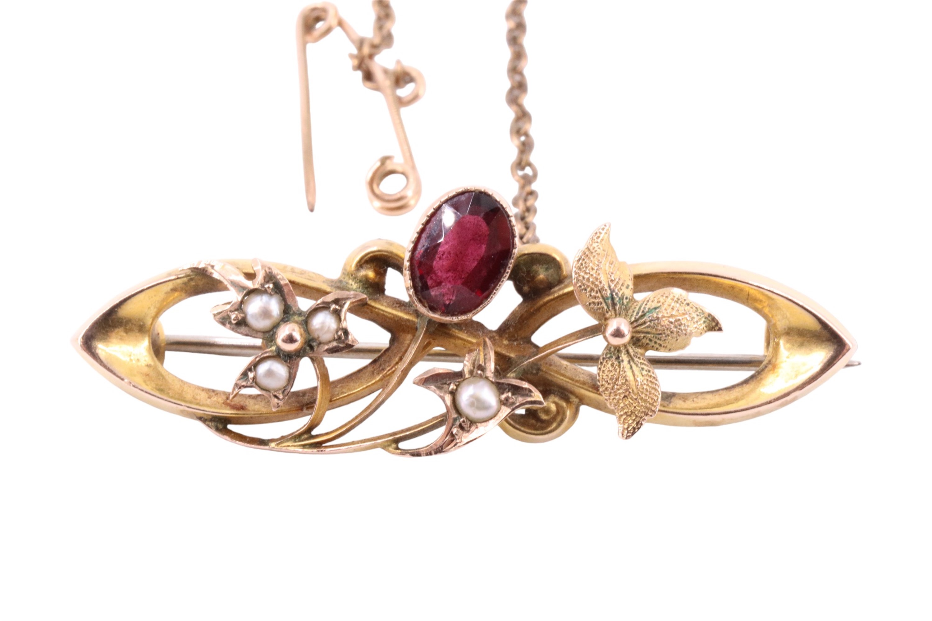 An Edwardian almandine, seed pearl and 9 ct gold floral sprig and scroll brooch, 42 mm, 3.4 g