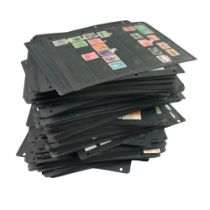 A very large quantity of stamp album pages containing a comprehensive collection of GB and world