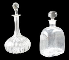 A Victorian cut glass wine decanter, having a ribbed oblate body and tall slender neck, together