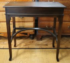 A contemporary hardwood writing desk, having a cantilever mechanical top, 74 x 44 x 81 cm