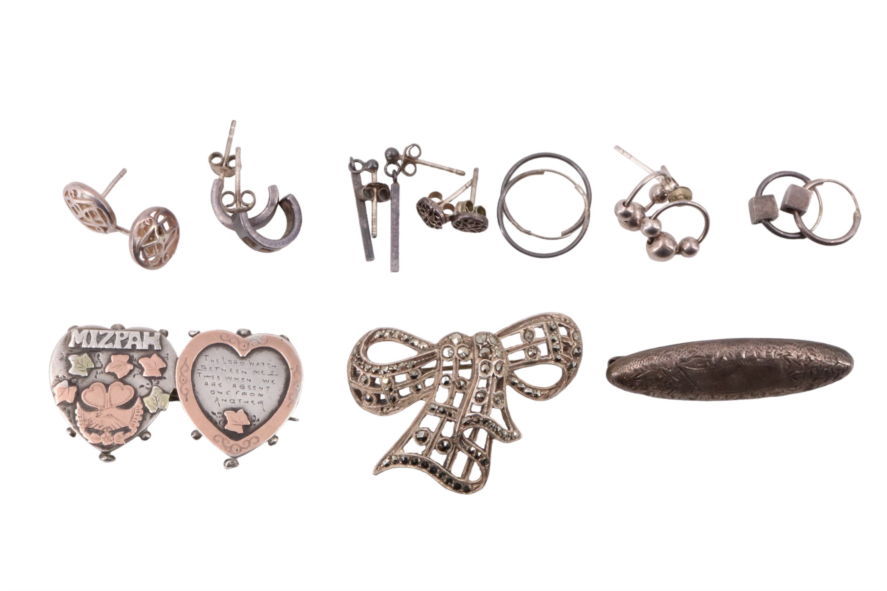 A quantity of silver and white metal jewellery, comprising finger rings, brooches, enamelled charm - Image 3 of 10