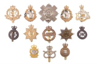 A small quantity of post 1952 cap badges