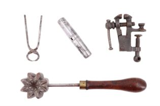 Three vintage tools, comprising a miniature table-clamping cast iron vice, a pocket tool kit and