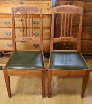A pair of late 20th Century elm standard chairs by Ian Laval, having burr walnut inlay and tradition