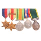 A Second World War campaign medal group with Territorial Efficiency medal to 2042782 Bombr A F king,