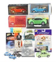 A quantity of boxed diecast model VW Beetles, Polizei etc