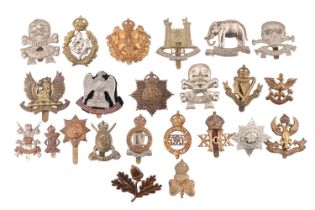 A collection of cavalry and yeomanry cap badges
