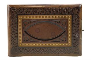 A Victorian Gothic style gilt tooled cartes de visite album retailed by Mason of Carlisle, inscribed