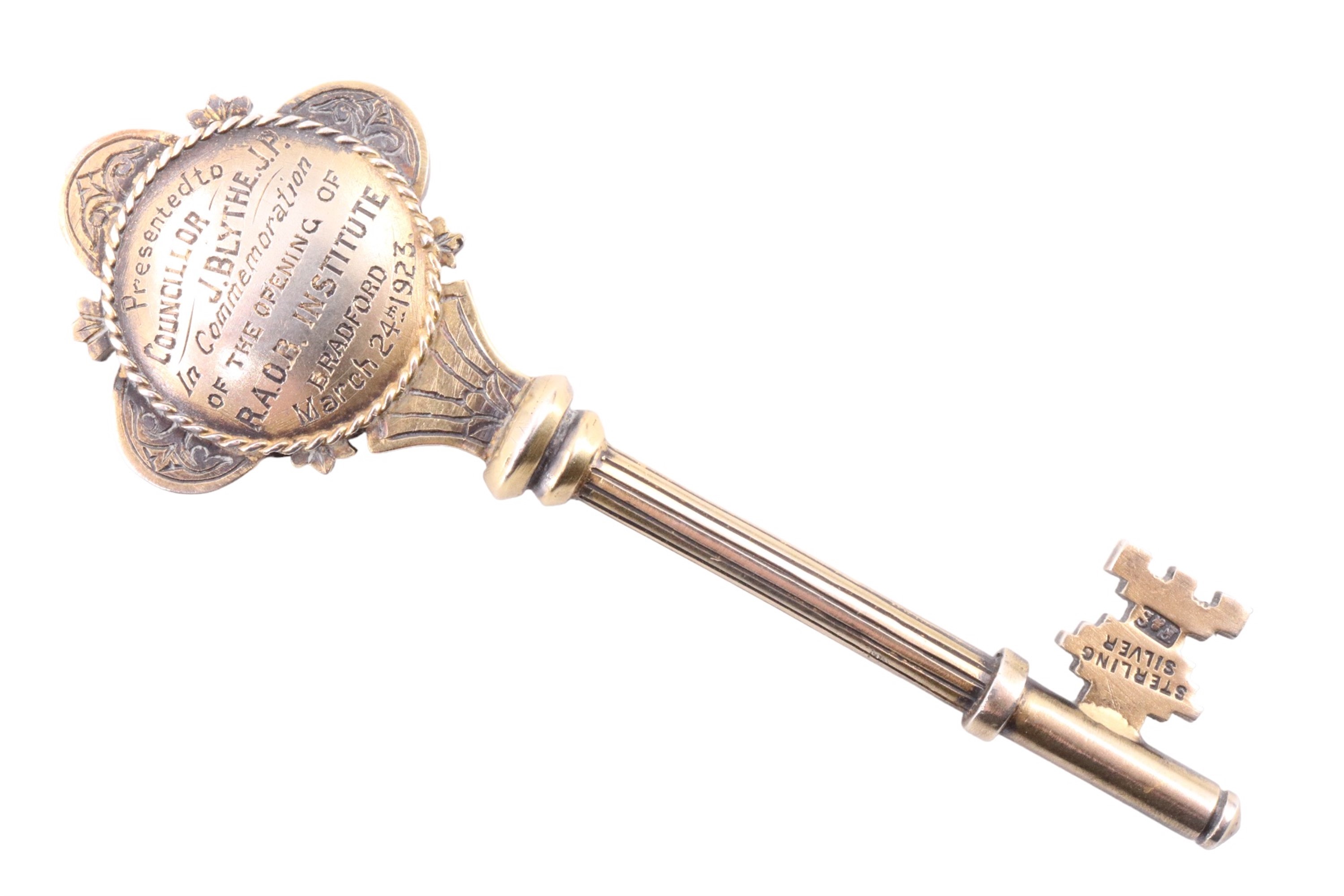 An enamelled gilt white-metal presentation key, engraved "Presented to Councillor J Blythe JP In - Image 2 of 3