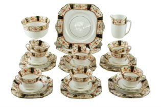 An Edwardian Gladstone China tea set, cup 9.5 x 6.5 cm excluding handle
