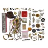 A quantity of vintage and later costume jewellery, including mother-of-pearl and horn brooches,