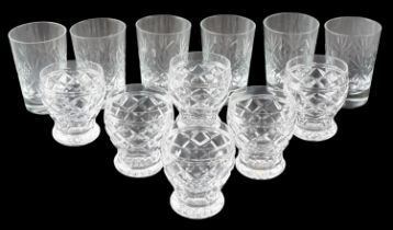 Two sets of six cut glass spirit tumblers, tallest 11.5 cm