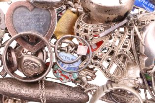 A quantity of silver and white metal jewellery, comprising finger rings, brooches, enamelled charm