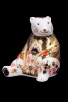 A Royal Crown Derby bear paperweight, having a gold stopper, 10 cm