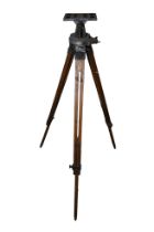 A surveyor's oak and cast aluminium tripod