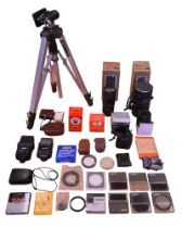 A quantity of camera equipment including two Vivitar lenses; f1:38 and f1:3.5, a Helios