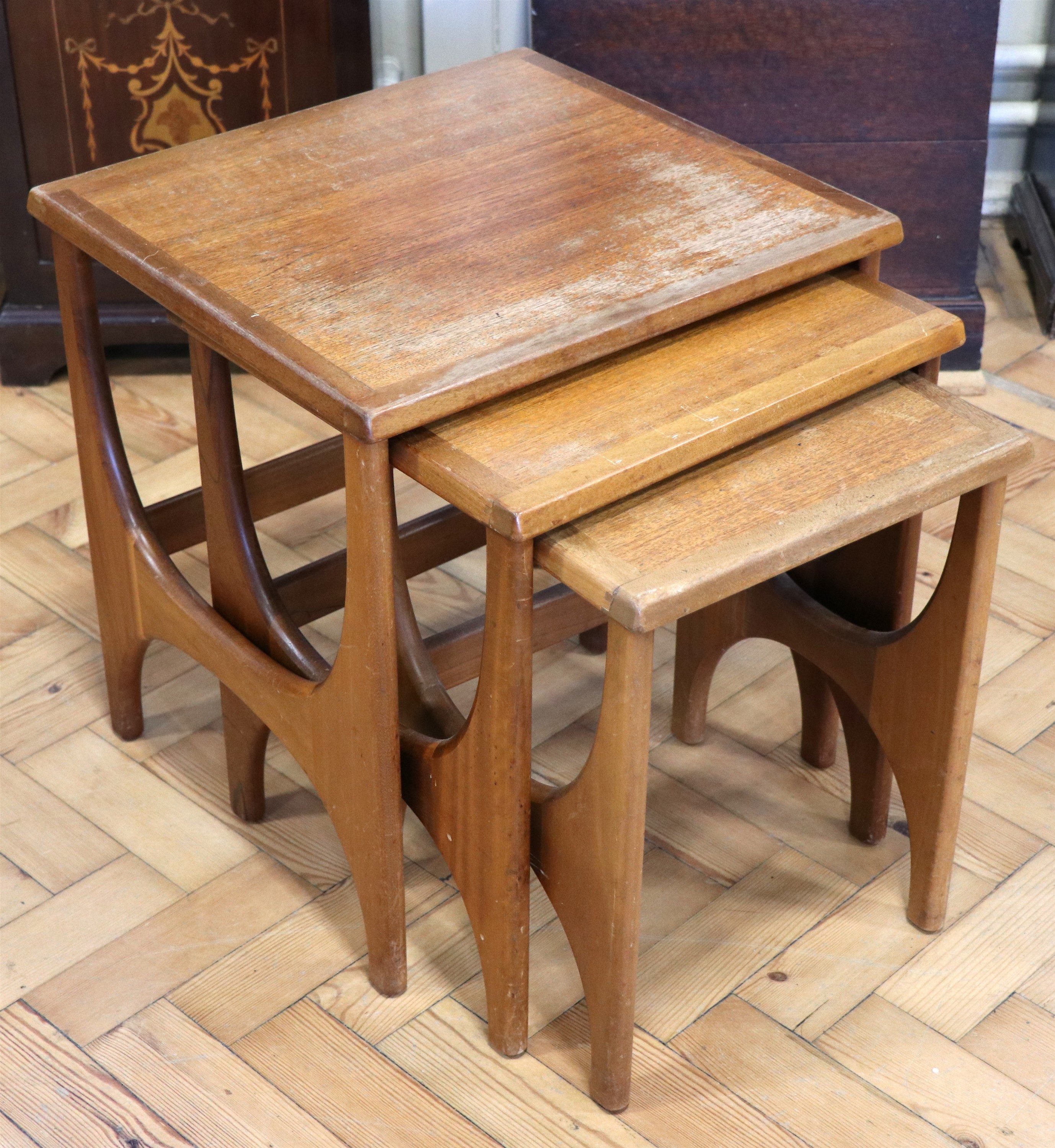 A Stonehill "Stateroom" teak nest of three tables