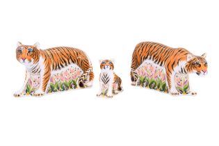 A family group of three Royal Crown Derby 'Sumatran Tiger' paperweights, a signature edition of