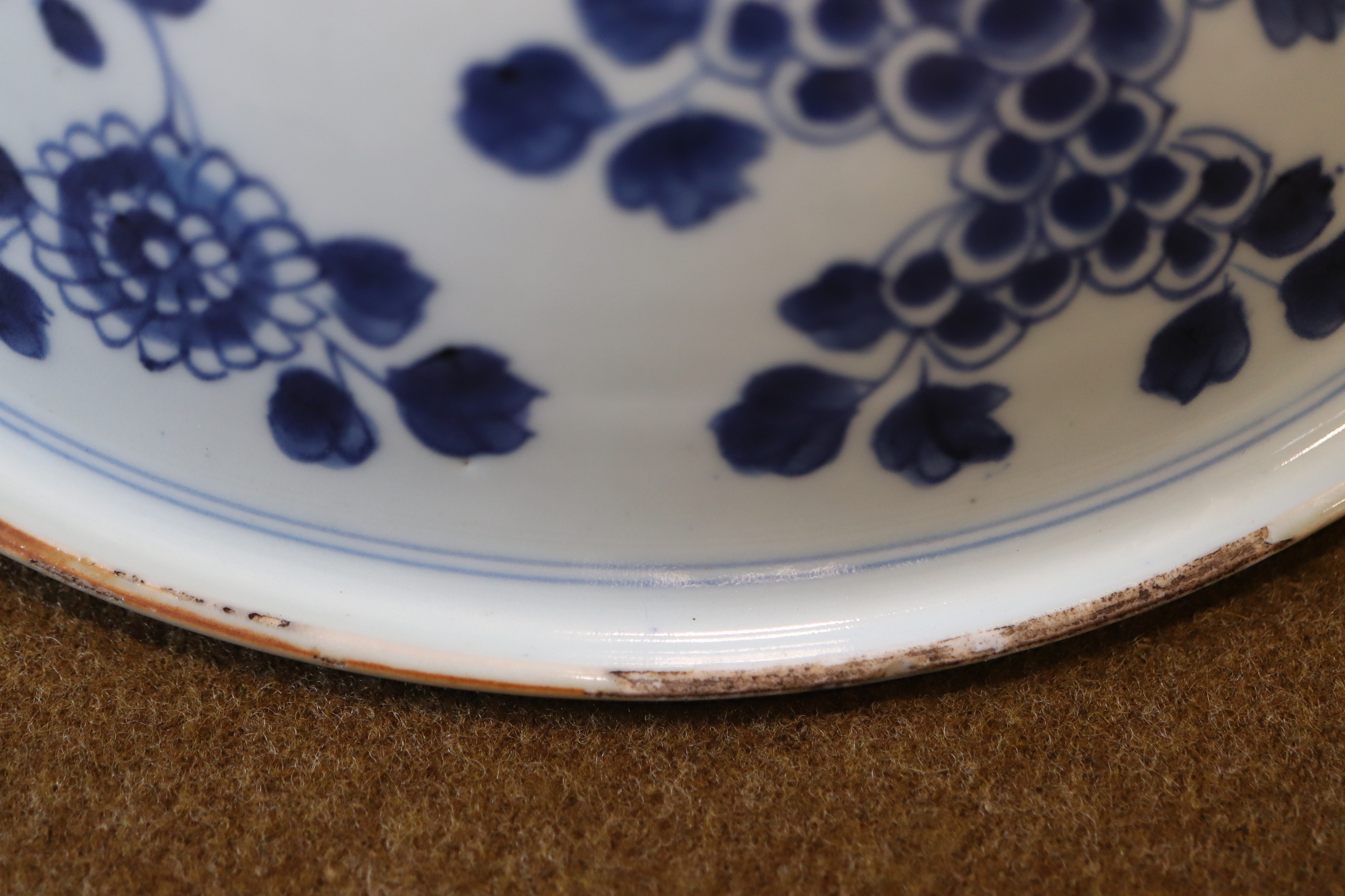 A late Quing Chinese blue-and-white porcelain bowl, circular with down-turned everted rim, decorated - Image 7 of 9