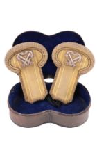 A cased pair of naval officer's full dress shoulder boards, bullion wire embroidered and bearing