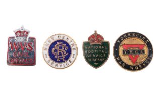 Four various British Home Front enamelled lapel badges including Yorkshire YMCA War Worker and