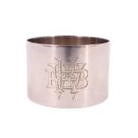 A cased 1920s silver napkin ring, faced with engraved initials, Sydney & Co, Birmingham, 1922, 41 mm