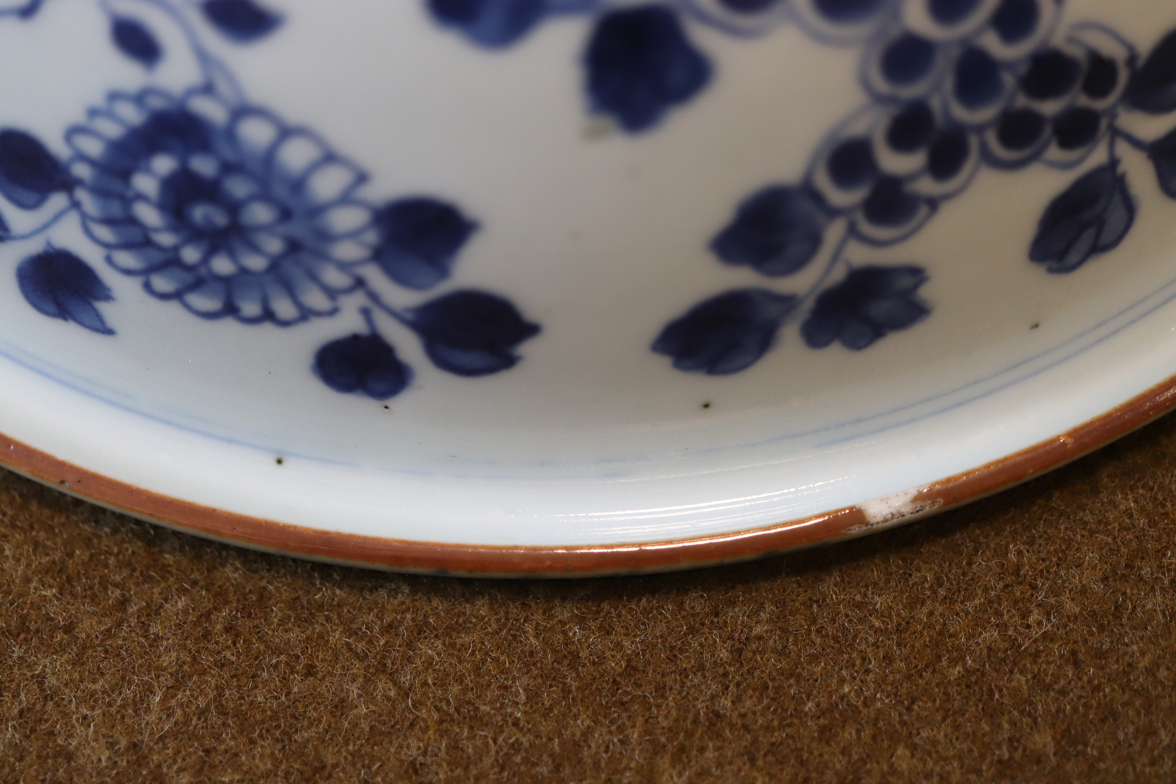 A late Quing Chinese blue-and-white porcelain bowl, circular with down-turned everted rim, decorated - Image 9 of 9