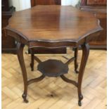 A late 19th / early 20 Century mahogany occasional table, having acanthus hipped planar cabriole