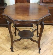 A late 19th / early 20 Century mahogany occasional table, having acanthus hipped planar cabriole