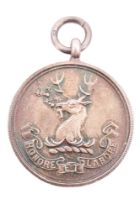 A 1913 "Honore et Labore" silver fob medallion