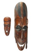 Two Ethiopian / African carved wood masks, circa 1960s / 1970s, larger 69 cm, (larger a/f)