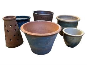 Five glazed terracotta garden planters together with a strawberry or similar planter, largest 37 x